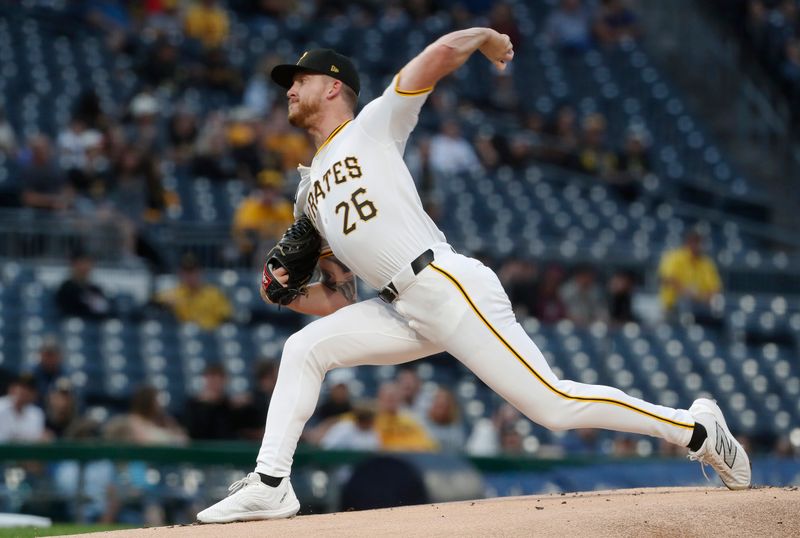 Sep 24, 2024; Pittsburgh, Pennsylvania, USA; Pittsburgh Pirates starting pitcher Bailey Falter (26) pitches against the Milwaukee Brewers during the first inning at PNC Park. Mandatory Credit: Charles LeClaire-Imagn Images