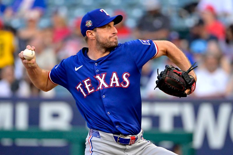 Jul 9, 2024; Anaheim, California, USA;  Texas Rangers starting pitcher Max Scherzer (31) delivers to the plate in the first inning against the Los Angeles Angels at Angel Stadium. Mandatory Credit: Jayne Kamin-Oncea-USA TODAY Sports