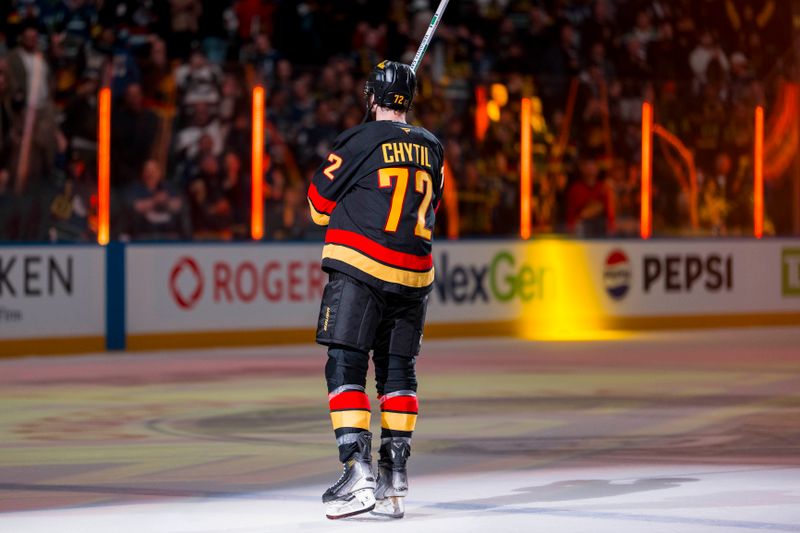 Oct 9, 2025; Vancouver, British Columbia, CAN;  Vancouver Canucks forward Filip Chytil (72) skates out as the game’s first star against the Calgary Flames at Rogers Arena. Mandatory Credit: Bob Frid-Imagn Images