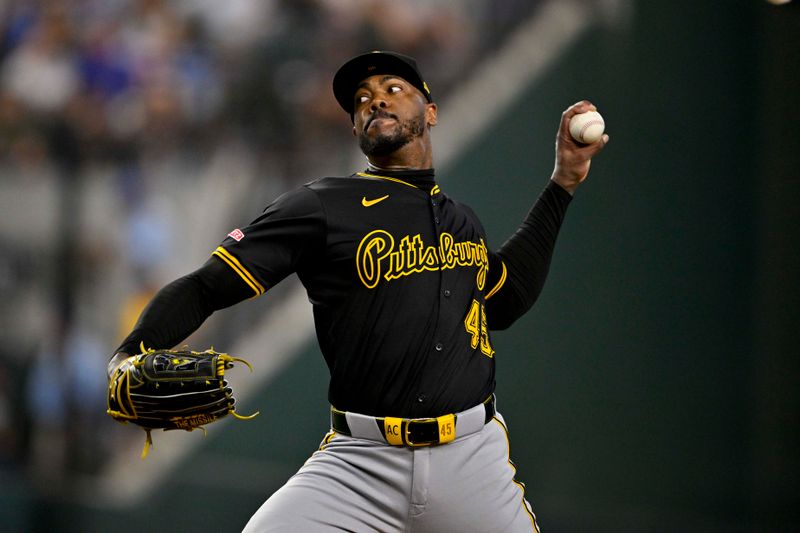 Aug 21, 2024; Arlington, Texas, USA; Pittsburgh Pirates relief pitcher Aroldis Chapman (45) pitches against the Texas Rangers during the eighth inning at Globe Life Field. Mandatory Credit: Jerome Miron-USA TODAY Sports