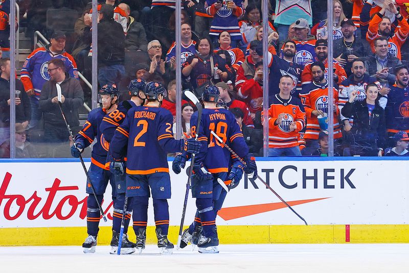 Feb 15, 2023; Edmonton, Alberta, CAN; The Edmonton Oilers celebrate a goal scored by forward Ryan Nugent-Hopkins (93) during the second period against the Detroit Red Wings at Rogers Place. Mandatory Credit: Perry Nelson-USA TODAY Sports