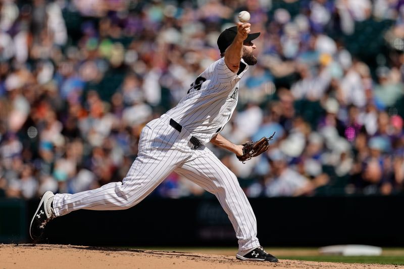 Sep 15, 2024; Denver, Colorado, USA; Colorado Rockies relief pitcher Jake Bird (59) pitches in the sixth inning against the Chicago Cubs at Coors Field. Mandatory Credit: Isaiah J. Downing-Imagn Images