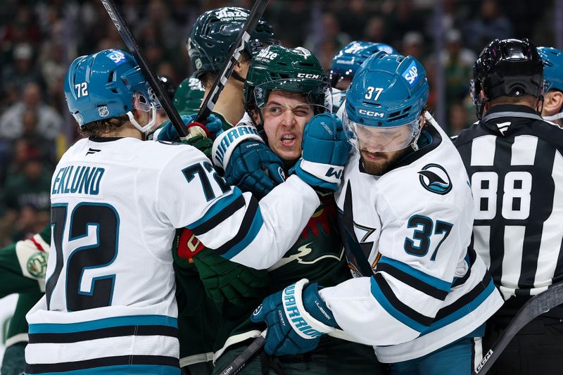Oct 26, 2025; Saint Paul, Minnesota, USA; Minnesota Wild and San Jose Sharks players get into a scrum during the third period at Grand Casino Arena. Mandatory Credit: Matt Krohn-Imagn Images
