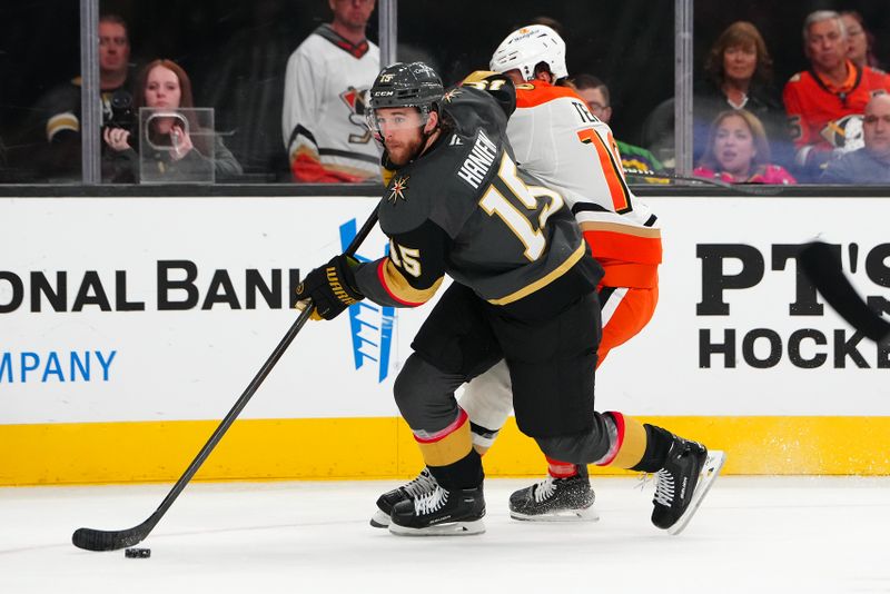 Oct 13, 2024; Las Vegas, Nevada, USA; Vegas Golden Knights defenseman Noah Hanifin (15) skates ahead of Anaheim Ducks right wing Troy Terry (19) during the third period at T-Mobile Arena. Mandatory Credit: Stephen R. Sylvanie-Imagn Images