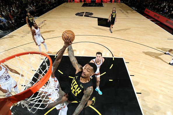 SALT LAKE CITY, UT - NOVEMBER 19: John Collins #20 of the Utah Jazz drives to the basket during the game against the Phoenix Suns on November 19, 2023 at Delta Center in Salt Lake City, Utah. NOTE TO USER: User expressly acknowledges and agrees that, by downloading and or using this Photograph, User is consenting to the terms and conditions of the Getty Images License Agreement. Mandatory Copyright Notice: Copyright 2023 NBAE (Photo by Melissa Majchrzak/NBAE via Getty Images)