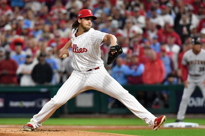 Oct 17, 2023; Philadelphia, Pennsylvania, USA; Philadelphia Phillies starting pitcher Aaron Nola (27) throws a pitch against the Arizona Diamondbacks during the first inning for game two of the NLCS for the 2023 MLB playoffs at Citizens Bank Park. Mandatory Credit: Eric Hartline-USA TODAY Sports