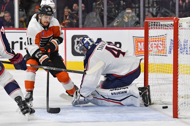 Jan 4, 2024; Philadelphia, Pennsylvania, USA; Philadelphia Flyers right wing Travis Konecny (11) scores a goal against Columbus Blue Jackets goaltender Daniil Tarasov (40) during the third period at Wells Fargo Center. Mandatory Credit: Eric Hartline-USA TODAY Sports