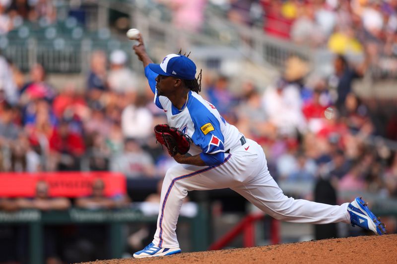 May 31, 2025; Atlanta, Georgia, USA; Atlanta Braves relief pitcher Rafael Montero (48) throws against the Boston Red Sox in the ninth inning at Truist Park. Mandatory Credit: Brett Davis-Imagn Images