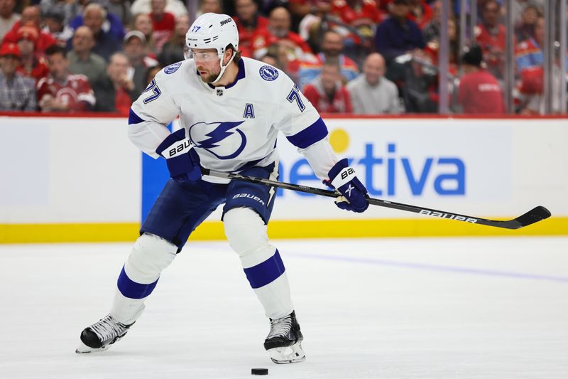 Apr 23, 2024; Sunrise, Florida, USA; Tampa Bay Lightning defenseman Victor Hedman (77) moves the puck against the Florida Panthers during the first period in game two of the first round of the 2024 Stanley Cup Playoffs at Amerant Bank Arena. Mandatory Credit: Sam Navarro-USA TODAY Sports