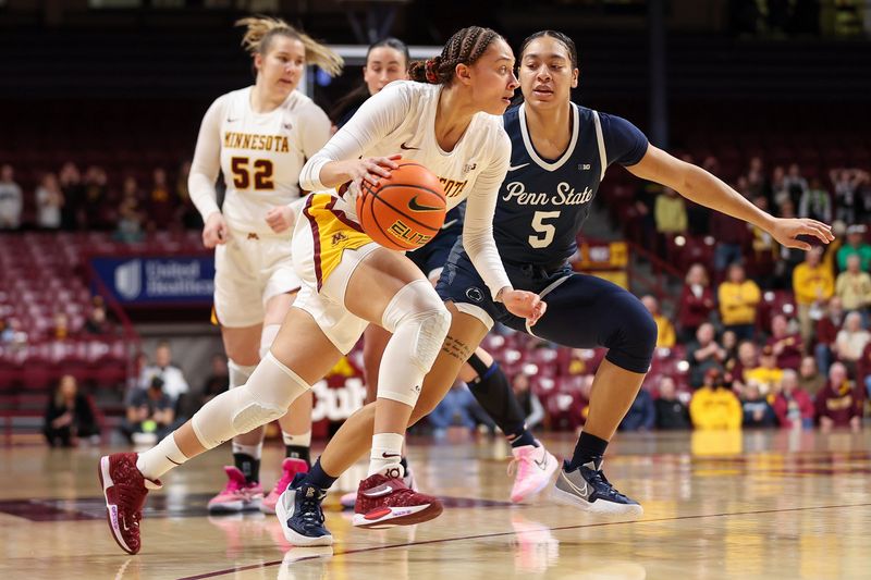 Jan 31, 2024; Minneapolis, Minnesota, USA; Minnesota Golden Gophers guard Amaya Battle (3) works around Penn State Nittany Lions guard Leilani Kapinus (5) during the first half at Williams Arena. Mandatory Credit: Matt Krohn-USA TODAY Sports