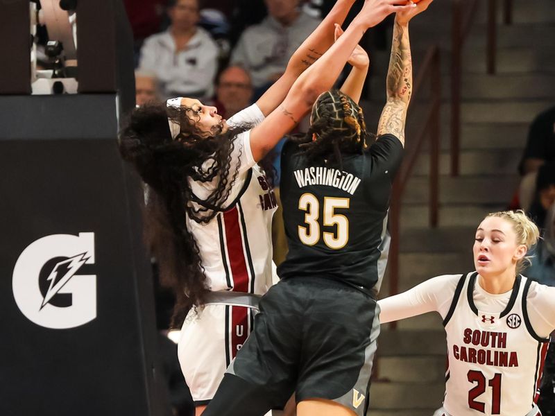 Jan 28, 2024; Columbia, South Carolina, USA; South Carolina Gamecocks center Kamilla Cardoso (10) blocks the shot of Vanderbilt Commodores forward Sacha Washington (35) in the first half at Colonial Life Arena. Mandatory Credit: Jeff Blake-USA TODAY Sports