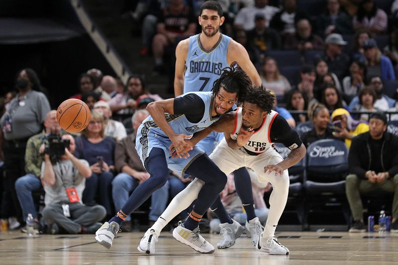 MEMPHIS, TENNESSEE - MARCH 02: Ziaire Williams #8 of the Memphis Grizzlies and Ashton Hagans #19 of the Portland Trail Blazers fight for the ball during the second half at FedExForum on March 02, 2024 in Memphis, Tennessee. NOTE TO USER: User expressly acknowledges and agrees that, by downloading and or using this photograph, User is consenting to the terms and conditions of the Getty Images License Agreement. (Photo by Justin Ford/Getty Images)