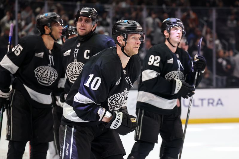 Jan 3, 2026; Los Angeles, California, USA;  Los Angeles Kings right wing Corey Perry (10) skates back to the bench after scoring a a power-play goal against the Minnesota Wild during the second period at Crypto.com Arena. Mandatory Credit: Kiyoshi Mio-Imagn Images