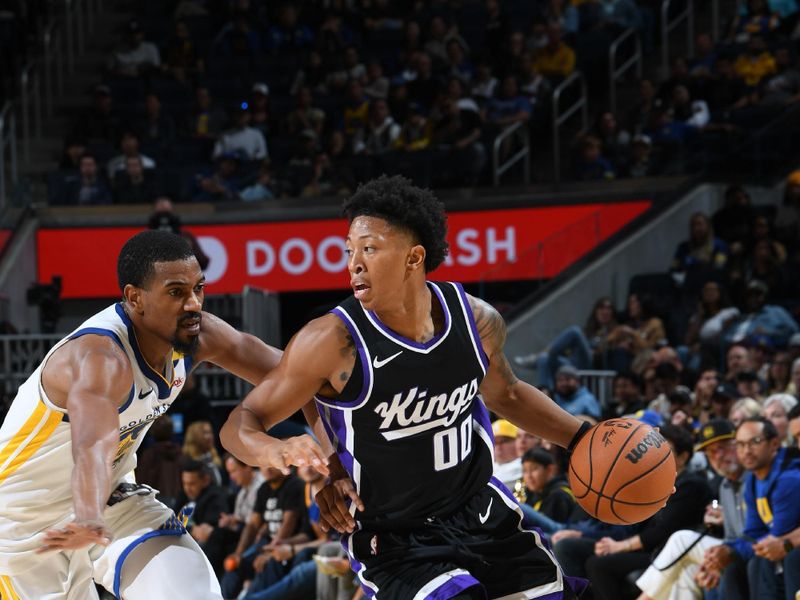 SAN FRANCISCO, CA - OCTOBER 11: Boogie Ellis #00 of the Sacramento Kings handles the ball during the game against the Golden State Warriors during a NBA Preseason game on October 11, 2024 at Chase Center in San Francisco, California. NOTE TO USER: User expressly acknowledges and agrees that, by downloading and or using this photograph, user is consenting to the terms and conditions of Getty Images License Agreement. Mandatory Copyright Notice: Copyright 2024 NBAE (Photo by Noah Graham/NBAE via Getty Images)