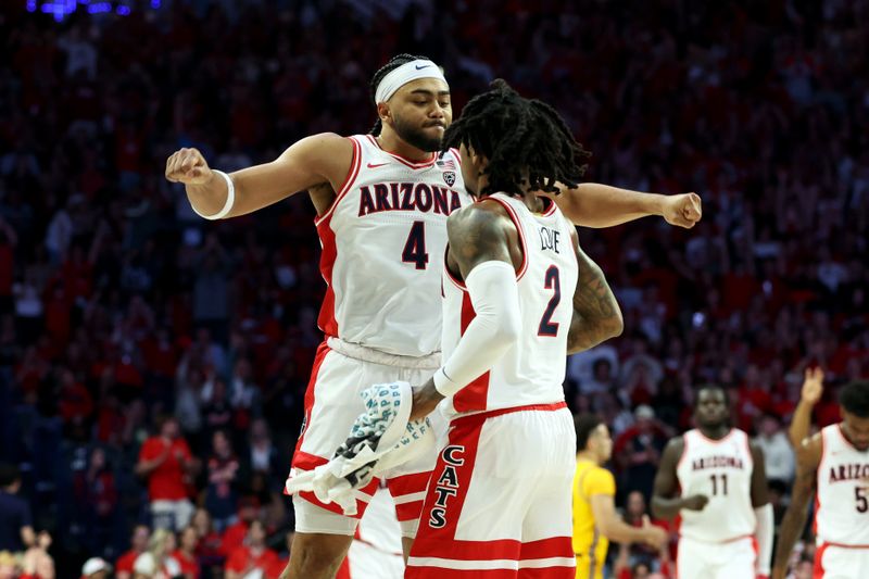 Feb 17, 2024; Tucson, Arizona, USA; Arizona Wildcats guard Kylan Boswell (4) celebrates a three point basket against the Arizona State Sun Devils with guard Caleb Love (2) during the first half at McKale Center. Mandatory Credit: Zachary BonDurant-USA TODAY Sports