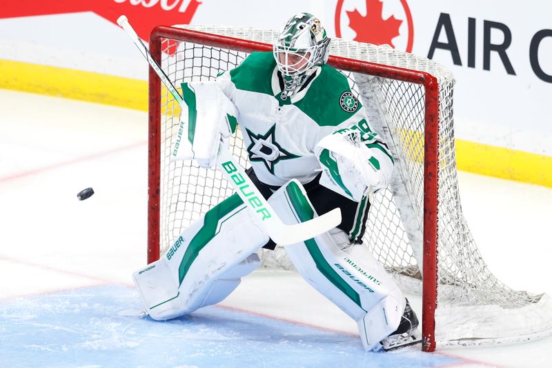 Nov 9, 2024; Winnipeg, Manitoba, CAN; Dallas Stars goaltender Jake Oettinger (29) warms up before a game against the Winnipeg Jets at Canada Life Centre. Mandatory Credit: James Carey Lauder-Imagn Images