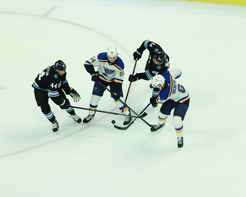 Sep 22, 2024; Des Moines, Iowa, USA;  Utah Hockey Club defenseman Kevin Connauton (44) and Utah Hockey Club forward Cole Beaudoin (24) battle St. Louis Blues Dalibor Dvorsky (54) and St. Louis Blues defenseman Philip Broberg (6) for the puck at Wells Fargo Arena. Mandatory Credit: Reese Strickland-Imagn Images

