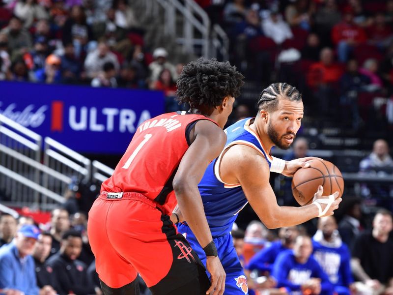 HOUSTON, TX - FEBRUARY 12: Jalen Brunson #11 of the New York Knicks looks to pass the ball during the game against the Houston Rockets on February 12, 2024 at the Toyota Center in Houston, Texas. NOTE TO USER: User expressly acknowledges and agrees that, by downloading and or using this photograph, User is consenting to the terms and conditions of the Getty Images License Agreement. Mandatory Copyright Notice: Copyright 2024 NBAE (Photo by Logan Riely/NBAE via Getty Images)