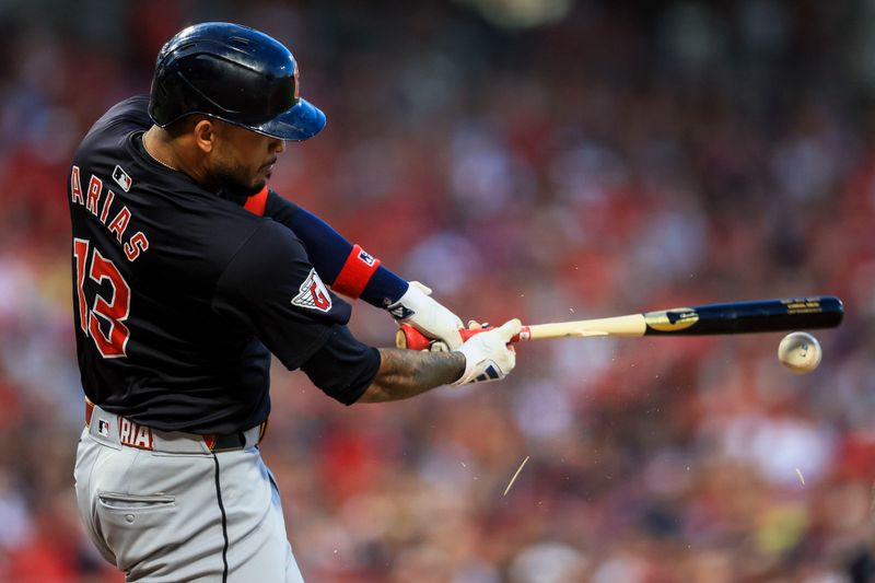 Jun 11, 2024; Cincinnati, Ohio, USA; Cleveland Guardians pinch hitter Gabriel Arias (13) breaks his bat on a hit in the sixth inning against the Cincinnati Reds at Great American Ball Park. Mandatory Credit: Katie Stratman-USA TODAY Sports