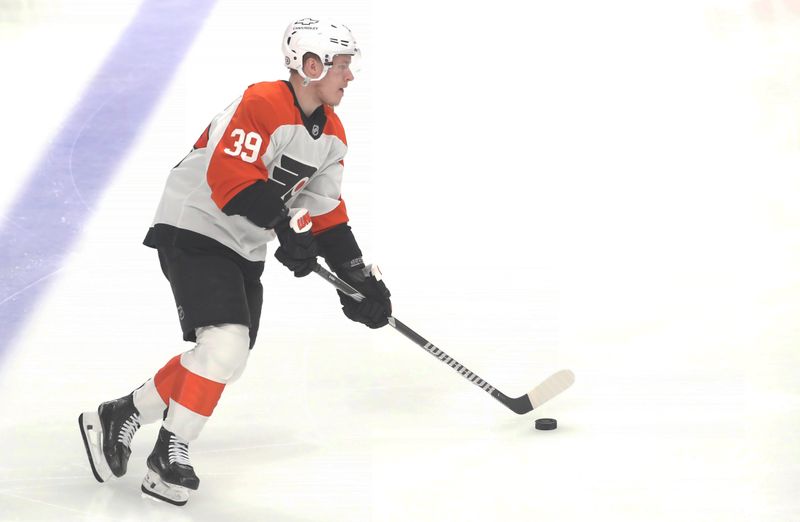 Feb 27, 2025; Pittsburgh, Pennsylvania, USA;  Philadelphia Flyers right wing Matvei Michkov (39) warms up against the Pittsburgh Penguins at PPG Paints Arena. Mandatory Credit: Charles LeClaire-Imagn Images