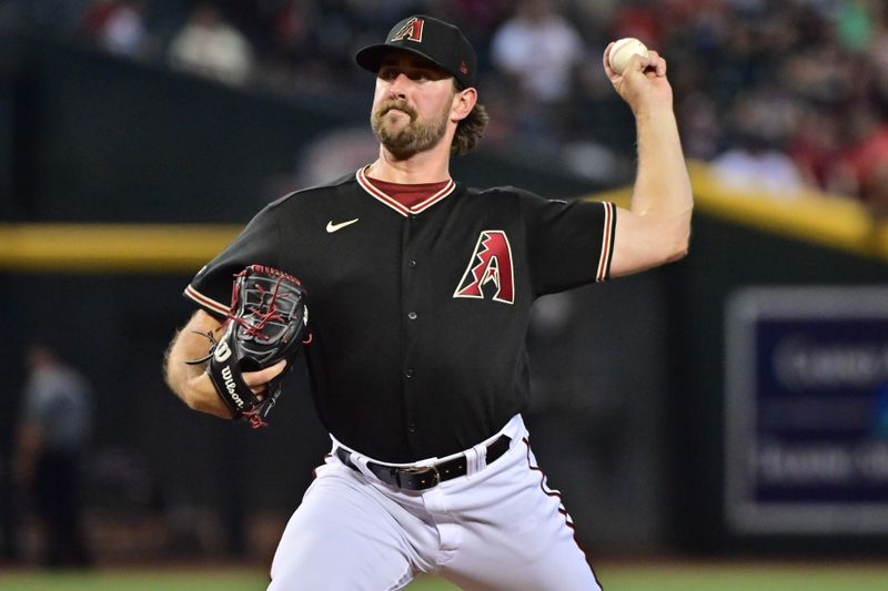 Jul 26, 2023; Phoenix, Arizona, USA;  Arizona Diamondbacks relief pitcher Tyler Gilbert (49) throws in the ninth inning against the St. Louis Cardinals at Chase Field. Mandatory Credit: Matt Kartozian-USA TODAY Sports