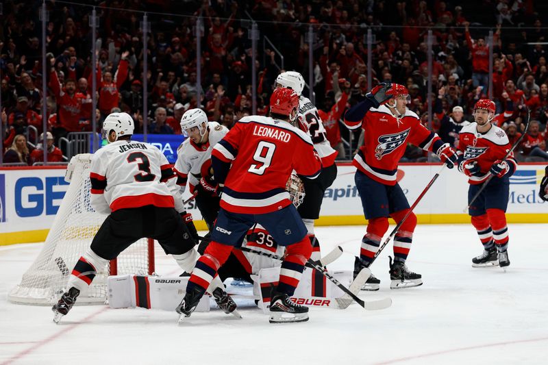 Oct 25, 2025; Washington, District of Columbia, USA; Washington Capitals defenseman Trevor van Riemsdyk (57) celebrates after scoring a goal on Ottawa Senators goaltender Linus Ullmark (35) during the third period at Capital One Arena. Mandatory Credit: Geoff Burke-Imagn Images