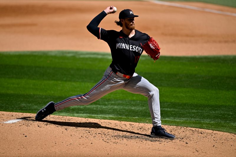 Sep 25, 2025; Arlington, Texas, USA; Minnesota Twins starting pitcher Bailey Ober (17) throws the ball during the fourth inning against the Texas Rangers at Globe Life Field. Mandatory Credit: Jerome Miron-Imagn Images