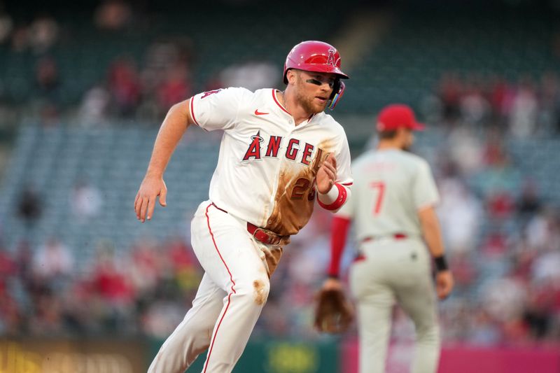 Apr 30, 2024; Anaheim, California, USA; Los Angeles Angels second baseman Brandon Drury (23) runs to third base in the second inning against the Philadelphia Phillies at Angel Stadium. Mandatory Credit: Kirby Lee-USA TODAY Sports