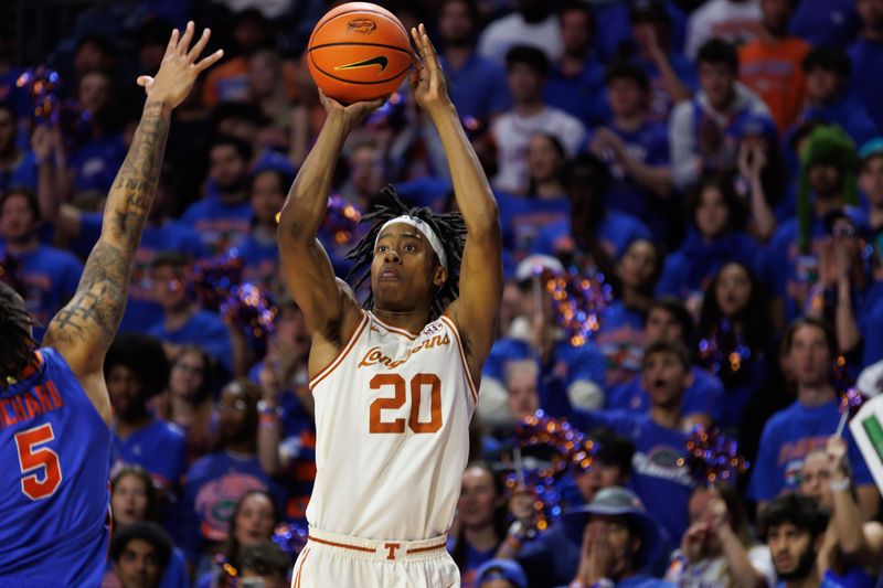 Jan 18, 2025; Gainesville, Florida, USA; Texas Longhorns guard Tre Johnson (20) shoots over Florida Gators guard Will Richard (5) during the first half at Exactech Arena at the Stephen C. O'Connell Center. Mandatory Credit: Matt Pendleton-Imagn Images