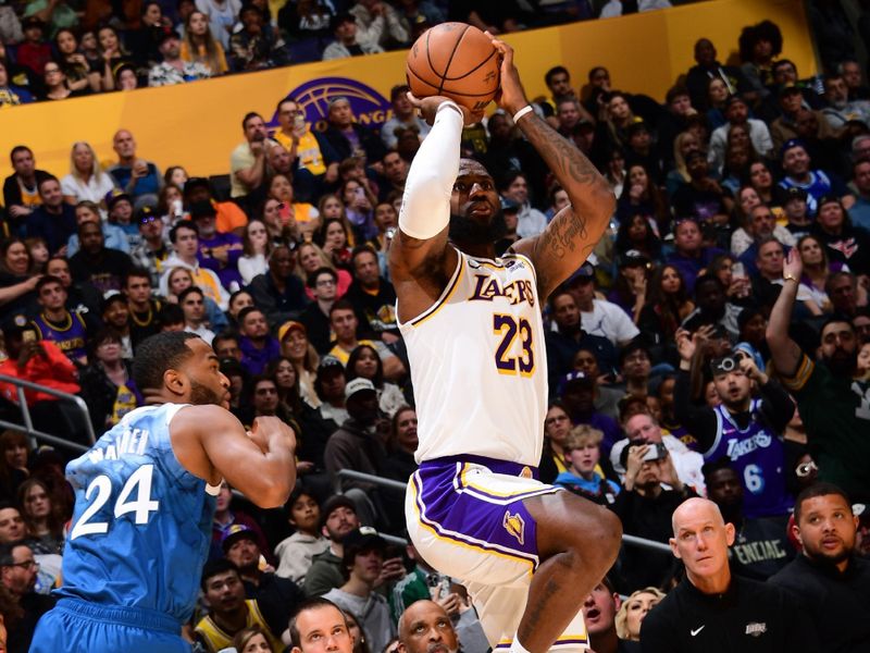 LOS ANGELES, CA - MARCH 10: LeBron James #23 of the Los Angeles Lakers shoots the ball during the game against the Minnesota Timberwolves on March 10, 2024 at Crypto.Com Arena in Los Angeles, California. NOTE TO USER: User expressly acknowledges and agrees that, by downloading and/or using this Photograph, user is consenting to the terms and conditions of the Getty Images License Agreement. Mandatory Copyright Notice: Copyright 2024 NBAE (Photo by Adam Pantozzi/NBAE via Getty Images)