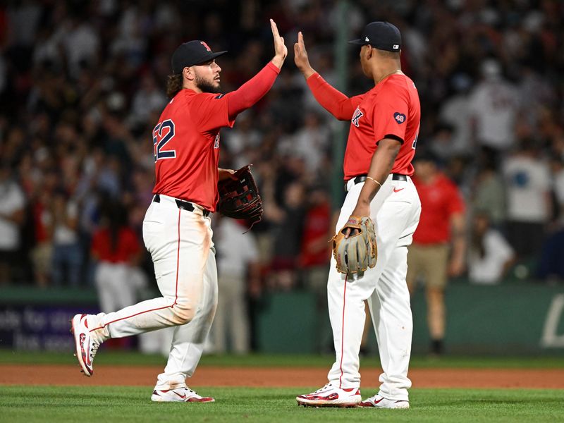 Jul 26, 2024; Boston, Massachusetts, USA; Boston Red Sox outfielder Wilyer Abreu (52) high-fives third basemanm Rafael Devers (11) after a game against the New York Yankees at Fenway Park. Mandatory Credit: Brian Fluharty-USA TODAY Sports