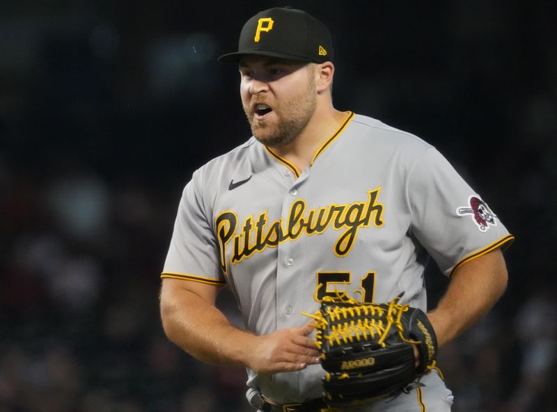 Jul 9, 2023; Phoenix, Arizona, USA; Pittsburgh Pirates pitcher David Bednar (51) celebrates defeating the Arizona Diamondbacks at Chase Field. Mandatory Credit: Joe Rondone-USA TODAY Sports