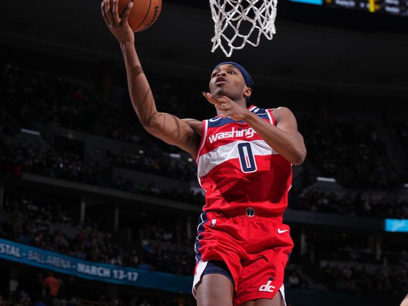 DENVER, CO - FEBRUARY 22: Bilal Coulibaly #0 of the Washington Wizards drives to the basket during the game against the Denver Nuggets on February 22, 2024 at the Ball Arena in Denver, Colorado. NOTE TO USER: User expressly acknowledges and agrees that, by downloading and/or using this Photograph, user is consenting to the terms and conditions of the Getty Images License Agreement. Mandatory Copyright Notice: Copyright 2024 NBAE (Photo by Garrett Ellwood/NBAE via Getty Images)