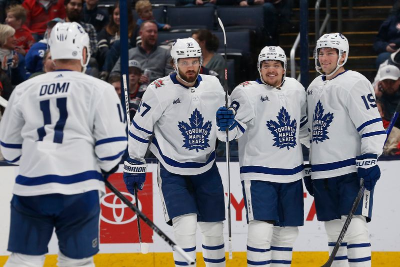 Dec 29, 2023; Columbus, Ohio, USA; Toronto Maple Leafs left wing Nicholas Robertson (89) celebrates his goal against the Columbus Blue Jackets during the second period at Nationwide Arena. Mandatory Credit: Russell LaBounty-USA TODAY Sports