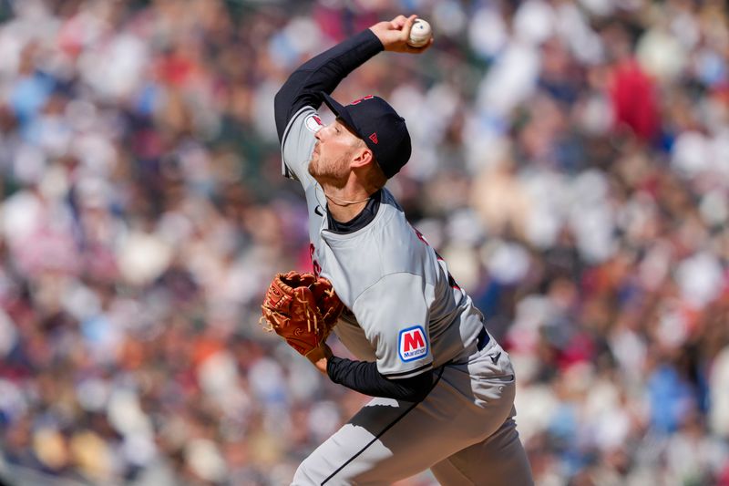 Apr 4, 2024; Minneapolis, Minnesota, USA; Cleveland Guardians starting pitcher Tanner Bibee (28) delivers a pitch during the first inning against the Minnesota Twins at Target Field. Mandatory Credit: Jordan Johnson-USA TODAY Sports