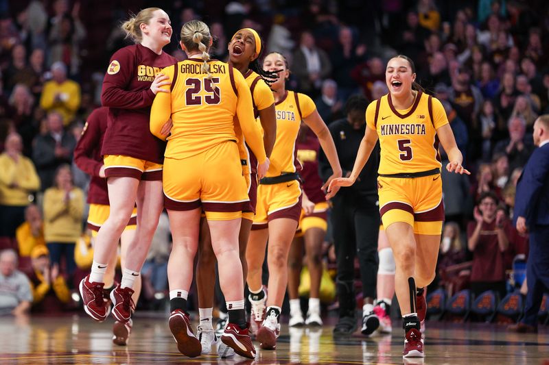 Jan 14, 2024; Minneapolis, Minnesota, USA; Minnesota Golden Gophers players celebrate the win after the game against the Nebraska Cornhuskers at Williams Arena. Mandatory Credit: Matt Krohn-USA TODAY Sports