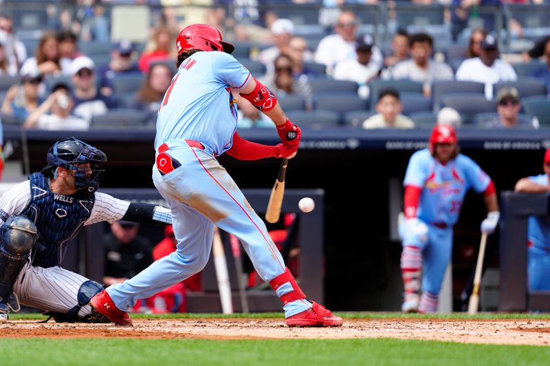 Aug 31, 2024; Bronx, New York, USA; St. Louis Cardinals designated hitter Alec Burleson (41) hits a single against the New York Yankees during the third inning at Yankee Stadium. Mandatory Credit: Gregory Fisher-USA TODAY Sports