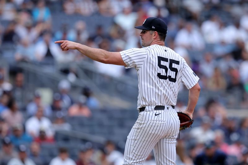 Jul 22, 2024; Bronx, New York, USA; New York Yankees starting pitcher Carlos Rodon (55) gestures during the seventh inning against the Tampa Bay Rays at Yankee Stadium. Mandatory Credit: Brad Penner-USA TODAY Sports