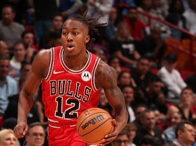 MIAMI, FL - DECEMBER 14: Ayo Dosunmu #12 of the Chicago Bulls dribbles the ball during the game against the Miami Heat on December 14, 2023 at Miami-Dade Arena in Miami, Florida. NOTE TO USER: User expressly acknowledges and agrees that, by downloading and or using this Photograph, user is consenting to the terms and conditions of the Getty Images License Agreement. Mandatory Copyright Notice: Copyright 2023 NBAE (Photo by Issac Baldizon/NBAE via Getty Images)