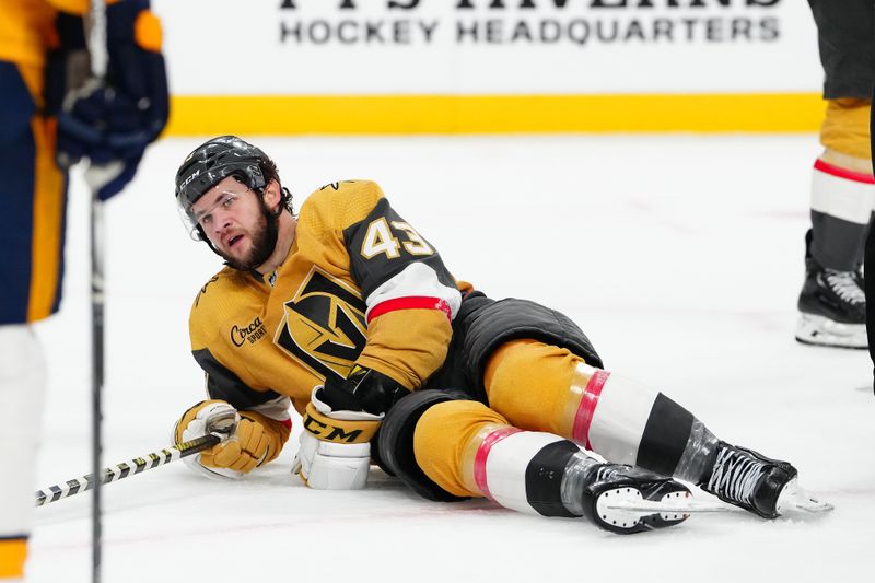 Feb 20, 2024; Las Vegas, Nevada, USA; Vegas Golden Knights center Paul Cotter (43) reacts after being knocked to the ice during a play against the Nashville Predators in the second period at T-Mobile Arena. Mandatory Credit: Stephen R. Sylvanie-USA TODAY Sports