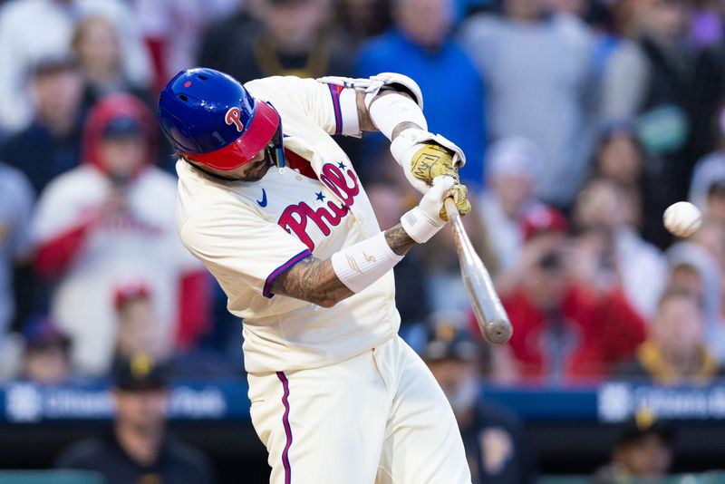 Apr 13, 2024; Philadelphia, Pennsylvania, USA; Philadelphia Phillies outfielder Nick Castellanos (8) hits a walk off RBI single during the ninth inning against the Pittsburgh Pirates at Citizens Bank Park. Mandatory Credit: Bill Streicher-USA TODAY Sports