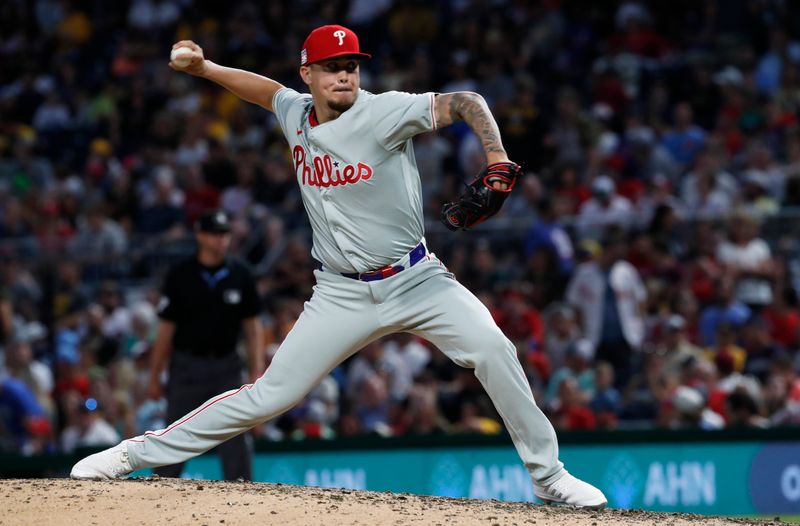 Jul 19, 2024; Pittsburgh, Pennsylvania, USA;  Philadelphia Phillies relief pitcher Orion Kerkering (50) pitches against the Pittsburgh Pirates during the seventh inning at PNC Park. Mandatory Credit: Charles LeClaire-USA TODAY Sports