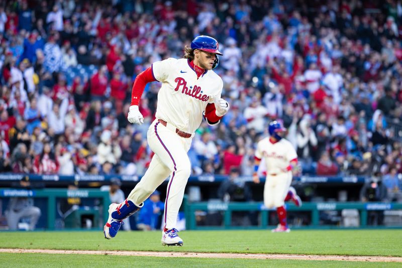 Apr 13, 2024; Philadelphia, Pennsylvania, USA; Philadelphia Phillies third base Alec Bohm (28) runs the bases after hitting an RBI single during the eighth inning against the Pittsburgh Pirates at Citizens Bank Park. Mandatory Credit: Bill Streicher-USA TODAY Sports