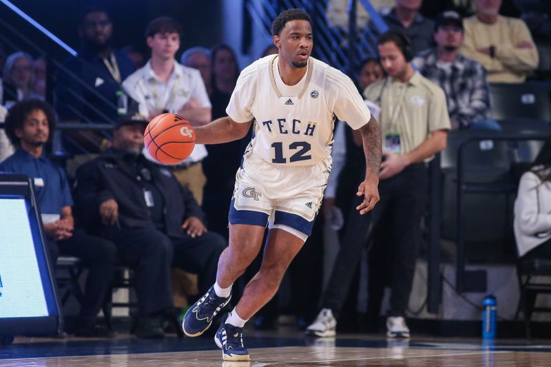 Feb 6, 2024; Atlanta, Georgia, USA; Georgia Tech Yellow Jackets forward Tyzhaun Claude (12) dribbles against the Wake Forest Demon Deacons in the first half at McCamish Pavilion. Mandatory Credit: Brett Davis-USA TODAY Sports
