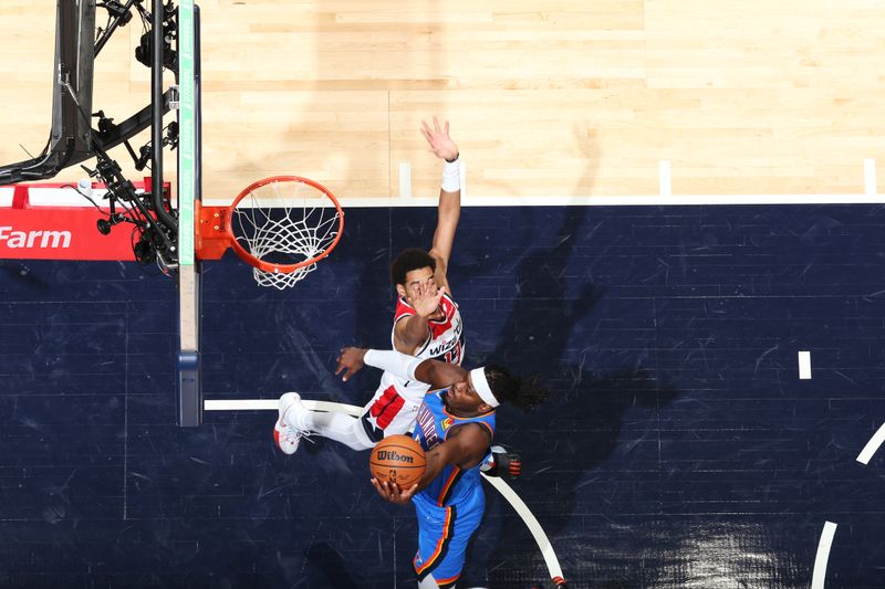 WASHINGTON, DC -? JANUARY 8: Luguentz Dort #5 of the Oklahoma City Thunder drives to the basket during the game against the Washington Wizards on January 8, 2024 at Capital One Arena in Washington, DC. NOTE TO USER: User expressly acknowledges and agrees that, by downloading and or using this Photograph, user is consenting to the terms and conditions of the Getty Images License Agreement. Mandatory Copyright Notice: Copyright 2024 NBAE (Photo by Stephen Gosling/NBAE via Getty Images)