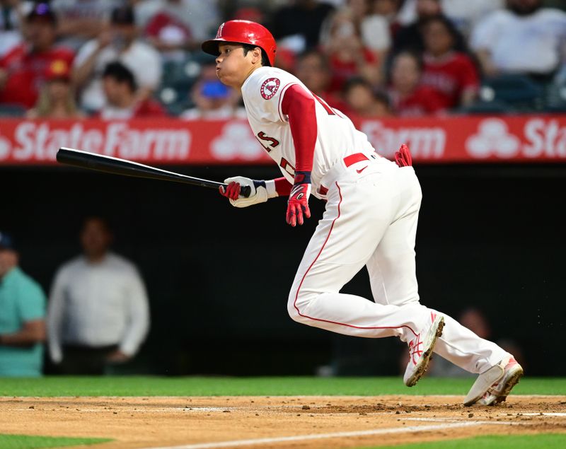 Apr 7, 2022; Anaheim, California, USA; Los Angeles Angels starting pitcher Shohei Ohtani (17) grounds out in the first inning against the Houston Astros at Angel Stadium. Mandatory Credit: Jayne Kamin-Oncea-USA TODAY Sports