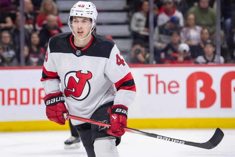 Apr 6, 2024; Ottawa, Ontario, CAN; New Jersey Devils defenseman Luke Hughes (43) skates in the first period against the  Ottawa Senators at the Canadian Tire Centre. Mandatory Credit: Marc DesRosiers-USA TODAY Sports