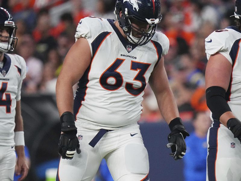 Denver Broncos offensive tackle Alex Palczewski (63) against the Los Angeles Rams of an NFL football game Saturday, Aug 26, 2023, in Denver. (AP Photo/Bart Young)