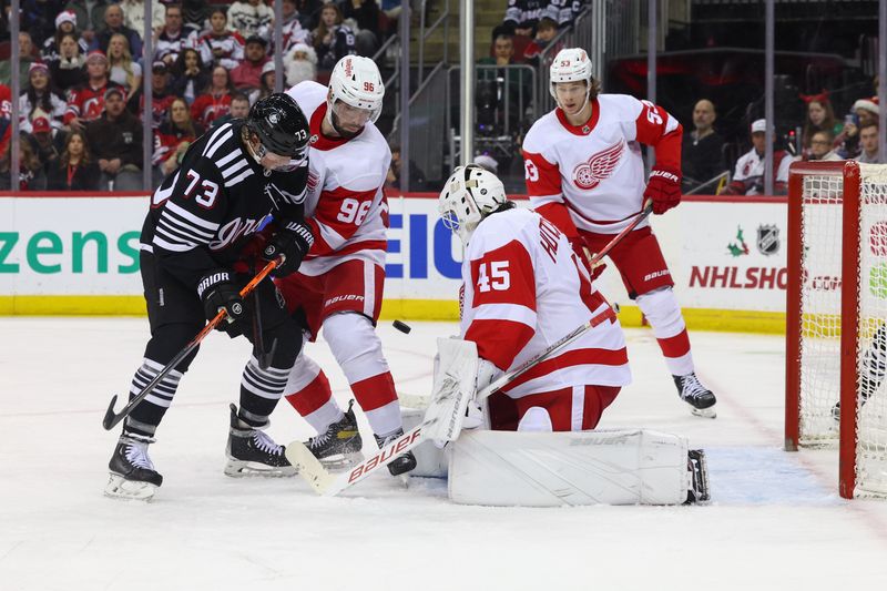 Dec 23, 2023; Newark, New Jersey, USA; Detroit Red Wings goaltender Michael Hutchinson (45) makes a save against the New Jersey Devils during the second period at Prudential Center. Mandatory Credit: Ed Mulholland-USA TODAY Sports