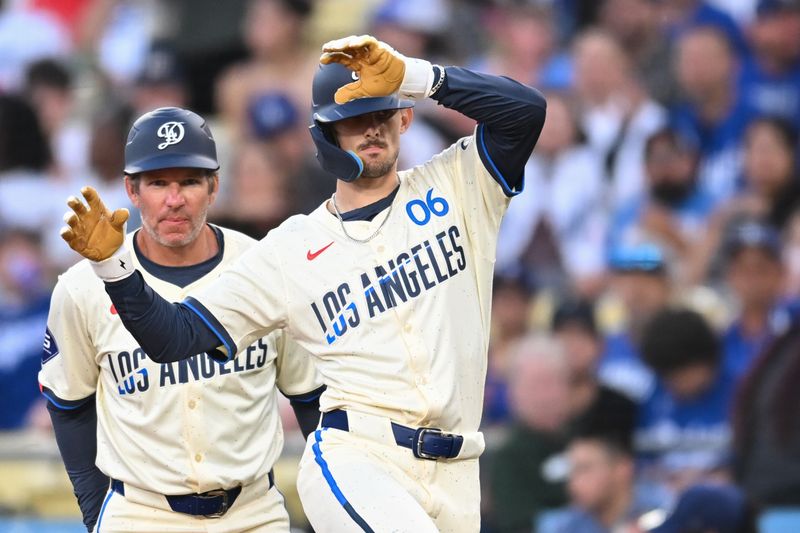 Jun 22, 2024; Los Angeles, California, USA; Los Angeles Dodgers third baseman Cavan Biggio (6) celebrates after hitting a single against the Los Angeles Angels during the third inning at Dodger Stadium. Mandatory Credit: Jonathan Hui-USA TODAY Sports